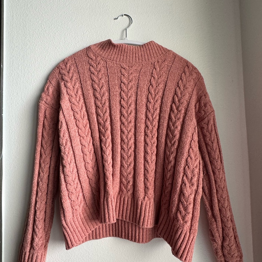 pink knitted turtle neck sweater